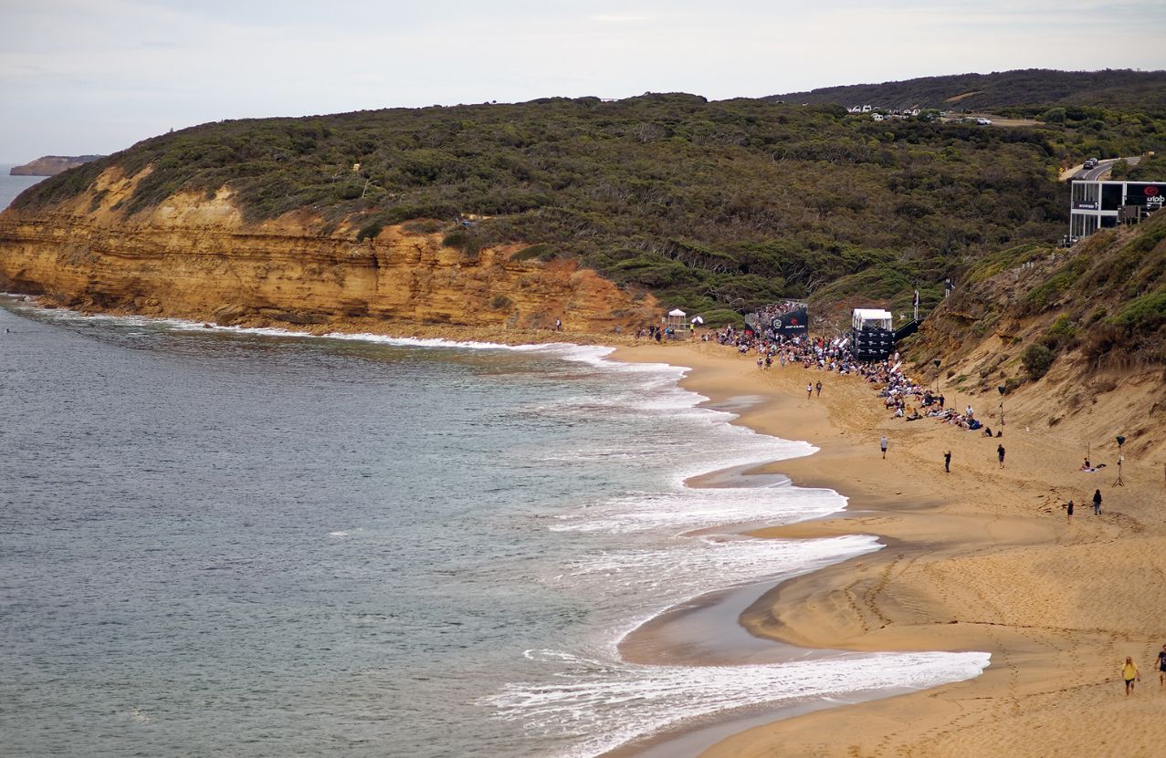 Bells Beach on contest day, the cliff, the crowd, and a long peel of surf.