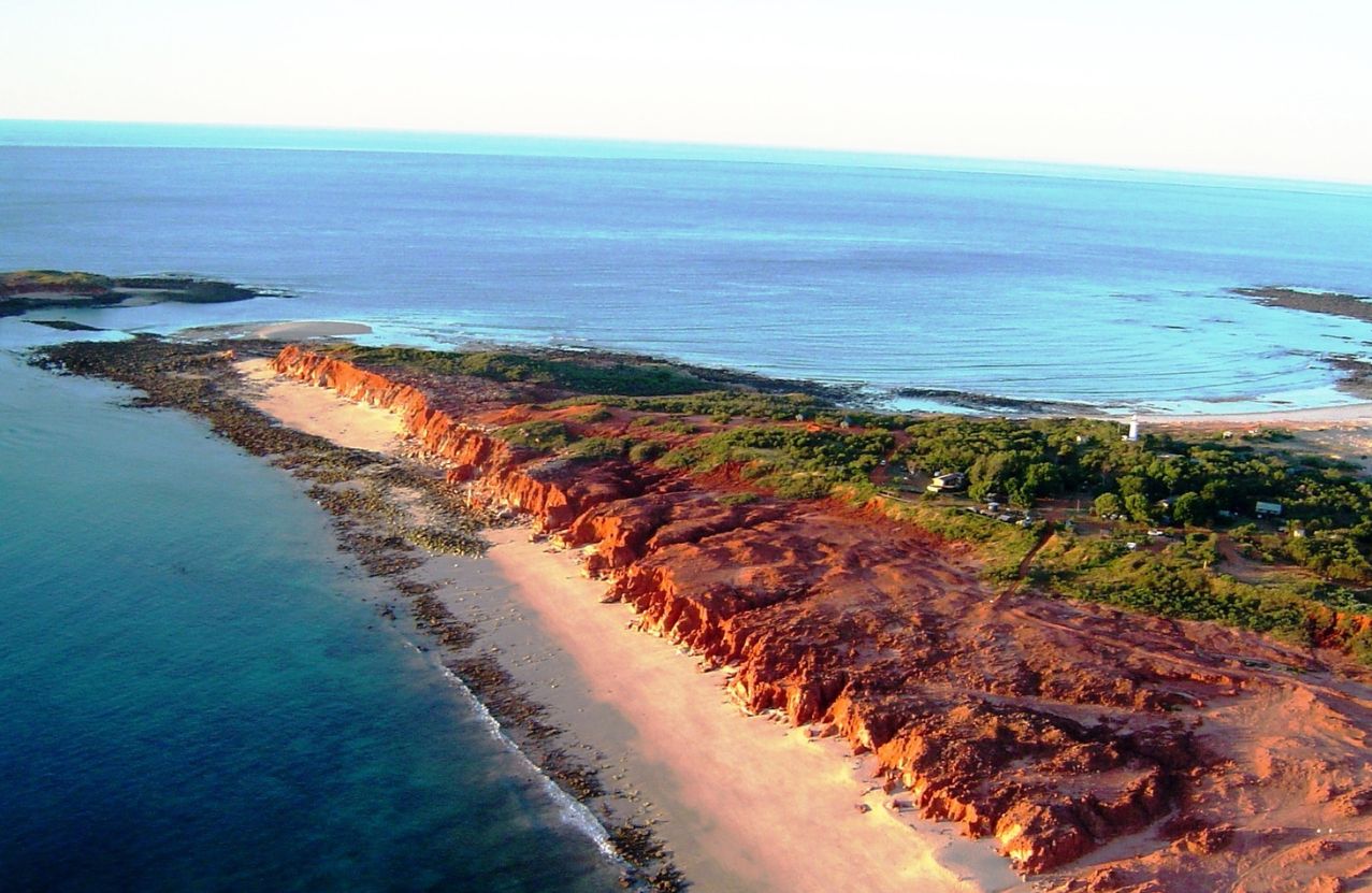 Cape Leveque, red pindan cliffs dropping onto a narrow beach.